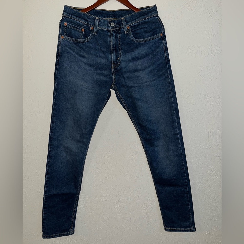 Levi’s 512 Tapered Jeans. Size: W31 L32. Color: Medium wash.